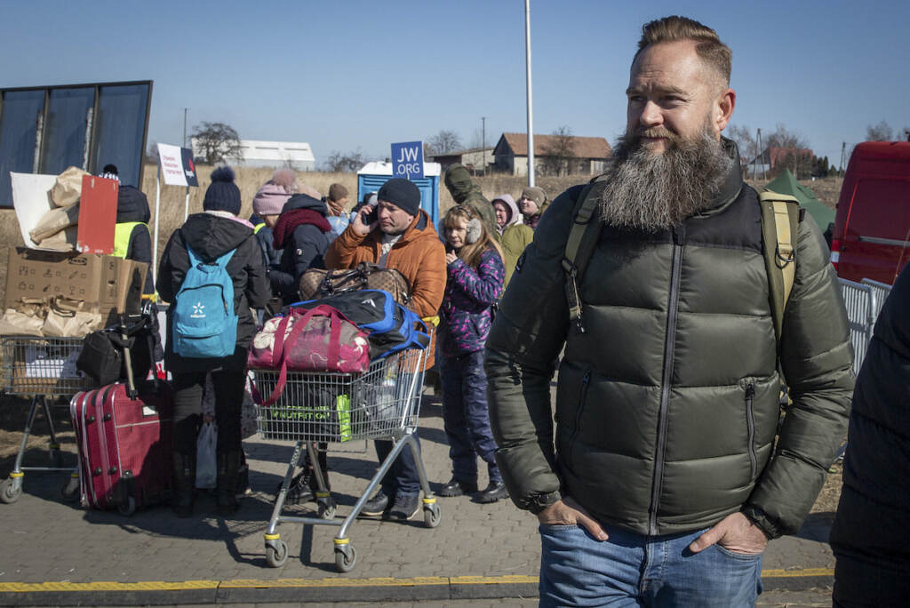 Russia Ukraine War Refugees Trafficking Former French Foreign Legion member identified as Mornay walks around the border crossing in Medyka, southeastern Poland, on Friday, March 11, 2022. At Poland's Medyka border, Mornay is one of seven former members of the French Foreign Legion, an elite military force, who are voluntarily providing their own security to refugees and are on the lookout for traffickers
