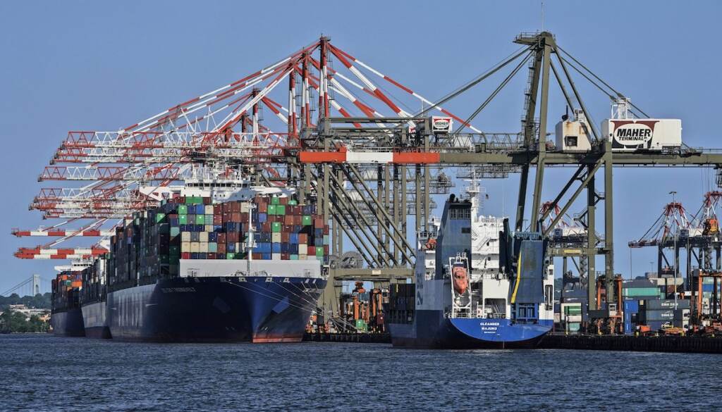 Waterfront Commission Lawsuit File photo: Container ships are docked at the Port of New York and New Jersey in Elizabeth, N.J., on May 20, 2021. A turf war over who polices the New York region's busy port complex is coming to a head as the state of New Jersey is preparing to withdraw from a bi-state commission formed to fight corruption