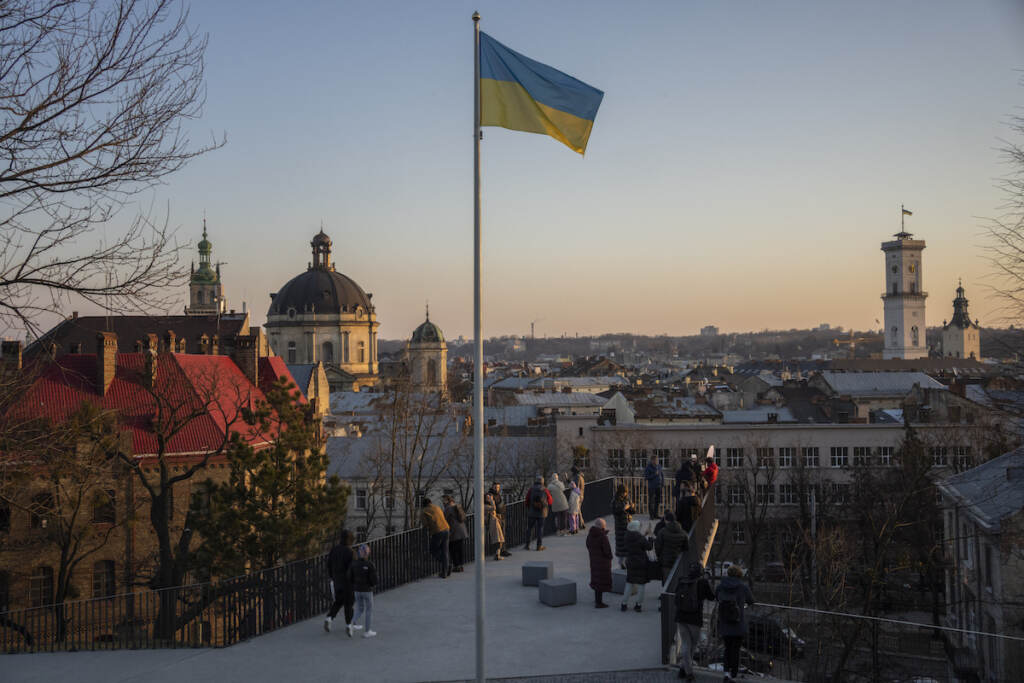 Russia Ukraine War People gather in a vantage point that overlooks the city of Lviv, western Ukraine, Saturday, March 19, 2022. (AP Photo/Bernat Armangue)