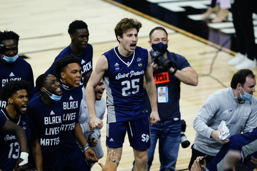 NCAA St Peters Purdue Basketball Saint Peter's Doug Edert celebrates after Saint Peter's won a college basketball game against Purdue in the Sweet 16 round of the NCAA tournament, Friday, March 25, 2022, in Philadelphia. (AP Photo/Matt Slocum)