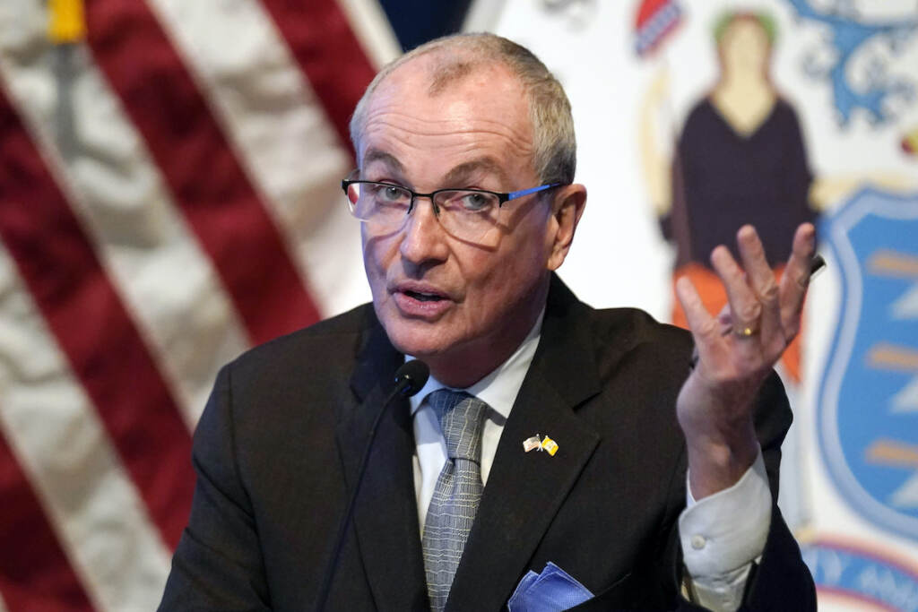 Phil Murphy New Jersey Governor Phil Murphy speaks in front of an American flag.