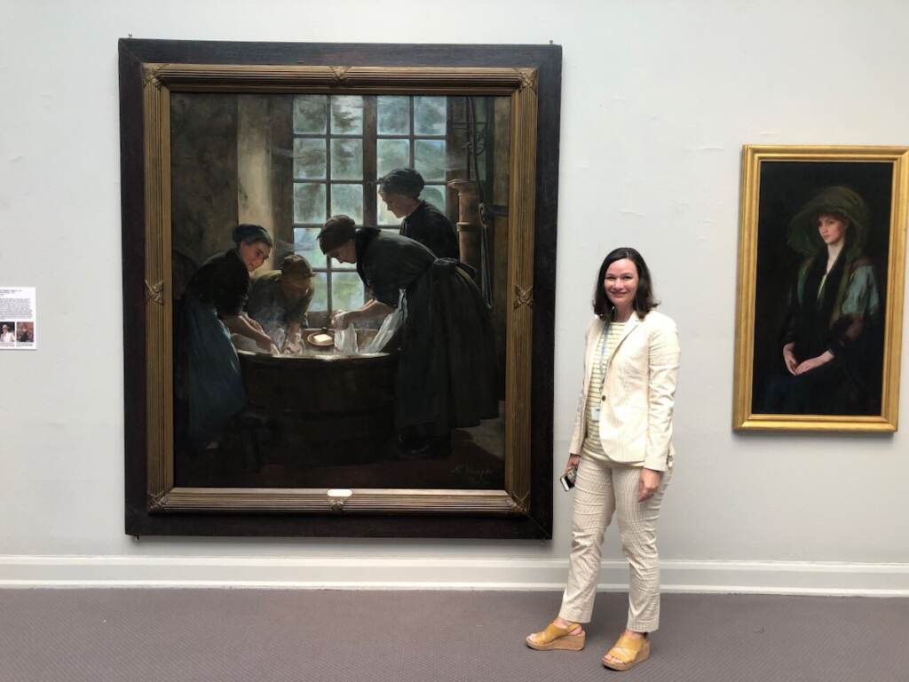 anna o marley Dr. Anna O. Marley stands in front of a painting hung on a wall at PAFA.