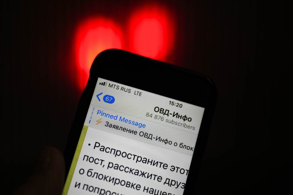 An iPhone screen shows a Telegram account of OVD-Info, prominent legal aid group in Russia that tracks political arrests in Moscow. An iPhone screen shows a Telegram account of OVD-Info, prominent legal aid group in Russia that tracks political arrests in Moscow. (Alexander Zemlianichenko/AP)