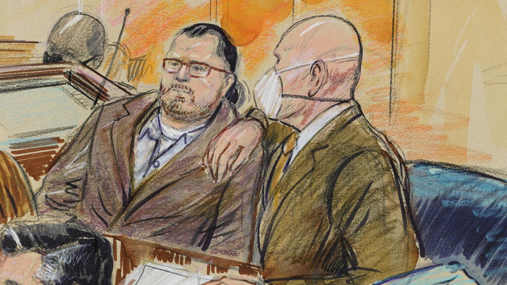 This artist sketch depicts Guy Wesley Reffitt, left, and his lawyer William Welch, right, in Federal Court in Washington, D.C., on Feb. 28. This artist sketch depicts Guy Wesley Reffitt, joined by his lawyer William Welch, right, in Federal Court, in Washington, Monday, Feb. 28, 2022. (Dana Verkouteren via AP)