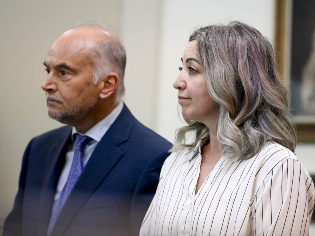RaDonda Vaught and her attorney, Peter Strianse, listen as verdicts are read at her trial in Nashville, Tenn., on Friday, March 25. The jury found Vaught, a former nurse, guilty of criminally negligent homicide and gross neglect of an impaired adult in the death of a patient to whom she accidentally gave the wrong medication. RaDonda Vaught and her attorney Peter Strianse listen as verdicts are read at the end of her trial in Nashville, Tenn., on Friday, March 25, 2022. (Nicole Hester/The Tennessean via AP, Pool)