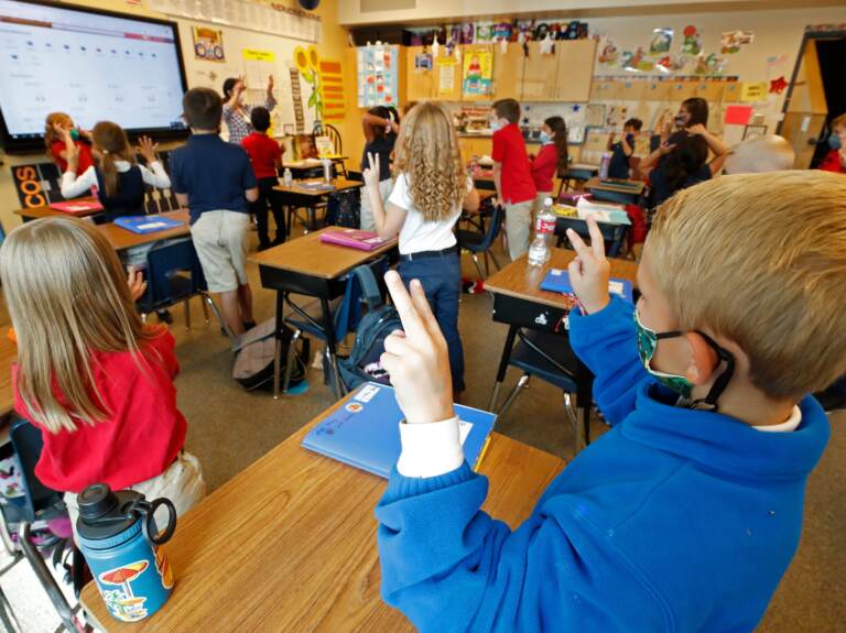 Students wear masks as a teacher instructs them at Freedom Preparatory Academy on Sept. 10, 2020 in Provo, Utah.
(GEORGE FREY/AFP via Getty Images)