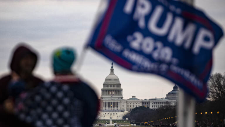 Supporters of then-President Donald Trump begin to gather for a rally on Jan. 6, 2021, in the vicinity of the U.S. Capitol and National Mall. Some of these supporters later rioted at the Capitol. New records show a gap of more than seven hours in Trump's phone call record around the time of the siege. (Samuel Corum/Getty Images)