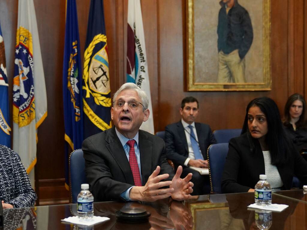Flanked by US Deputy Attorney General Lisa Monaco (L) and Associate Attorney General Vanita Gupta, Attorney General Merrick Garland convenes a Justice Department component heads meeting at the Justice Department on March 10. Garland was prompted by an NPR story on compassionate release waivers to fix the issue. Flanked by US Deputy Attorney General Lisa Monaco (left) and Associate Attorney General Vanita Gupta, Attorney General Merrick Garland convenes a Justice Department component heads meeting in advance of the anniversary of his swearing in, at the Justice Department in Washington, DC, on March 10, 2022. (Kevin Lamarque//Pool/AFP via Getty Images)