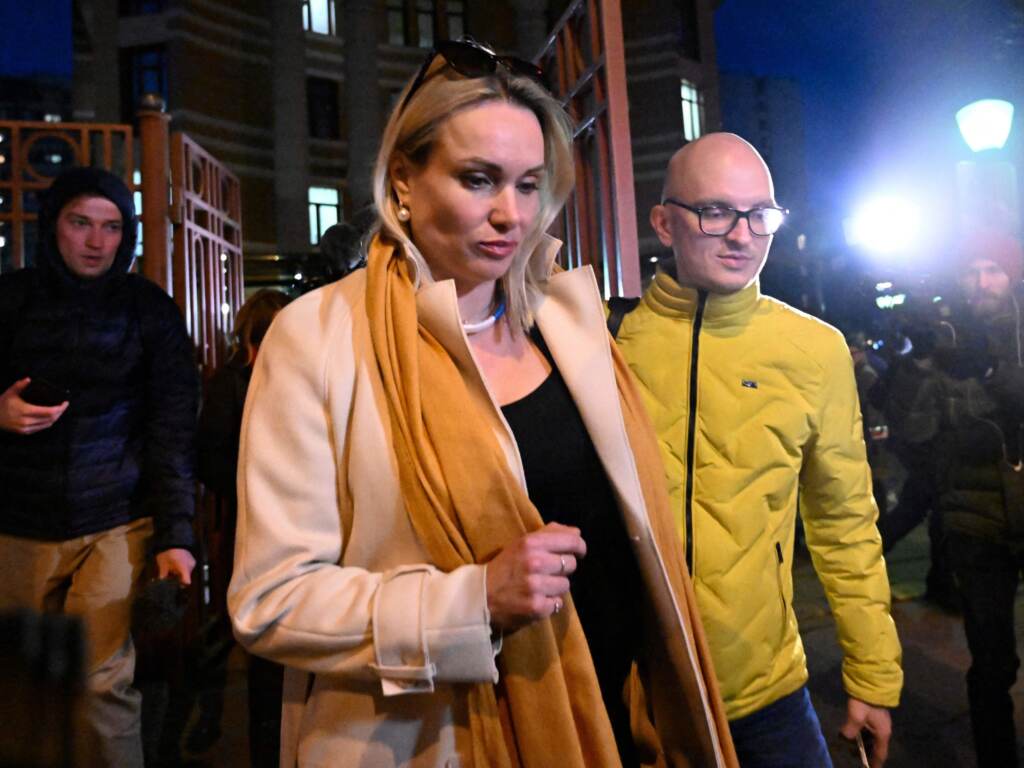 Marina Ovsyannikova, the editor at the state broadcaster Channel One who protested against Russian military action in Ukraine, will reportedly face a fine of between 30,000 and 50,000 rubles when her case is heard on April 14. Marina Ovsyannikova, the editor at the state broadcaster Channel One who protested against Russian military action in Ukraine during the evening news broadcast at the station late Monday, leaves the Ostankinsky District Court after being fined for 30,000 rubles ($280, 247 euros) for breaching protest laws in Moscow on March 15, 2022. (AFP via Getty Images)
