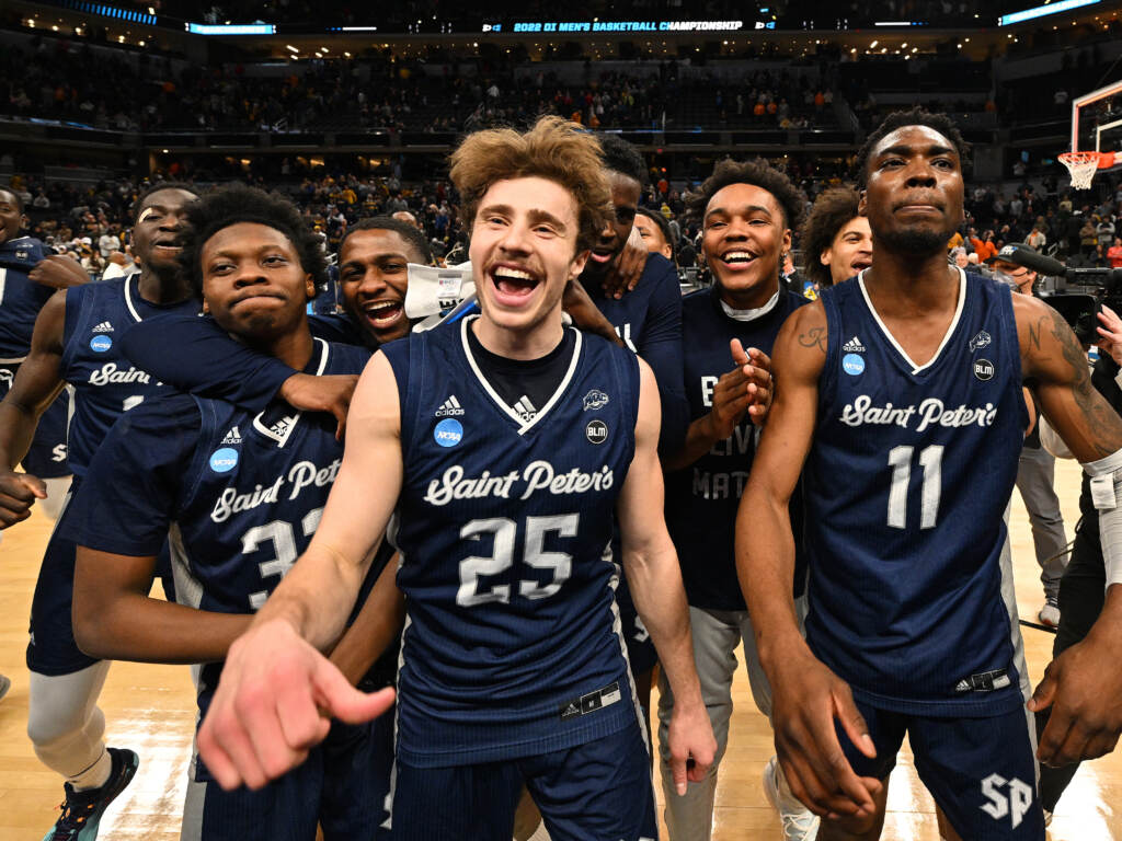 St. Peter’s Peacocks players celebrate after defeating Murray State Racers in the second round of the 2022 NCAA Men’s Basketball Tournament. St. Peter's Peacocks players celebrate after defeating Murray State Racers in the second round of the 2022 NCAA Men's Basketball Tournament held at Gainbridge Fieldhouse on March 19, 2022 in Indianapolis, Indiana. Murray State won 70-60. (Photo by Jamie Sabau/NCAA Photos via Getty Images)