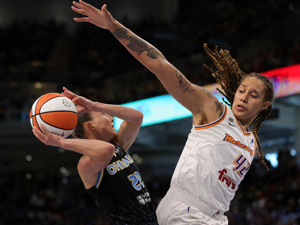 WNBA players Brittney Griner (right) of the Phoenix Mercury and Courtney Vandersloot of the Chicago Sky compete during the WNBA Finals in Chicago in October 2021. WNBA players Brittney Griner (right) of the Phoenix Mercury and Courtney Vandersloot of the Chicago Sky compete during the WNBA Finals in Chicago in October 2021. (Stacy Revere/Getty Images)