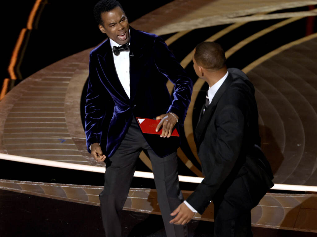 Chris Rock and Will Smith are seen onstage during the 94th Annual Academy Awards at Dolby Theatre following what appeared to be an altercation. Chris Rock and Will Smith are seen onstage during the 94th Annual Academy Awards at Dolby Theatre following what appeared to be an altercation. (Neilson Barnard/Getty Images)