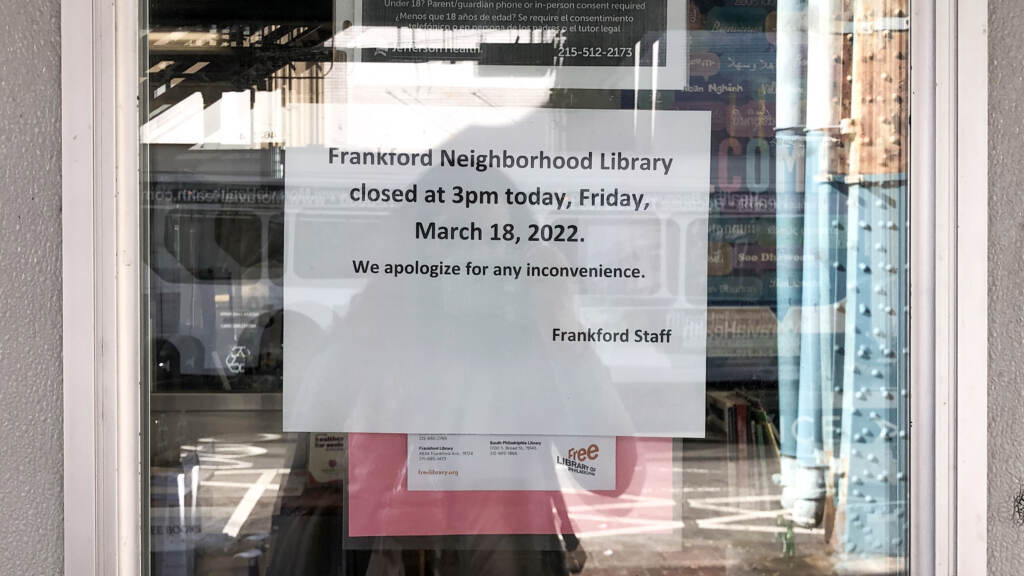 A sign outside Frankford Library indicates that it is closed