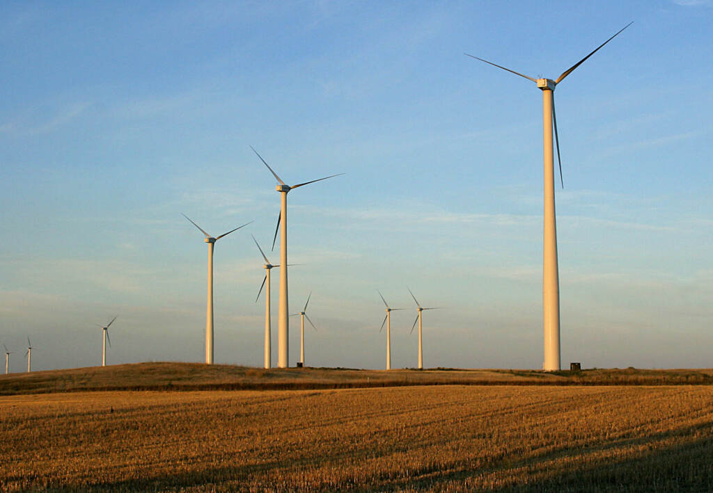 A windfarm near Velva, N.D. The 213-foot wind towers are owned by Global Renewable Energy Partners and Acciona Energia and purchased by Xcel Energy, which distributes the wind-generated electric power to its North Dakota customers. A wind turbine is silhouetted against the sky at sunset near Ellsworth, Kansas. The 300-foot-tall turbine is among the 134 units that make up the Post Rock Wind Farm. (Charlie Riedel/AP)