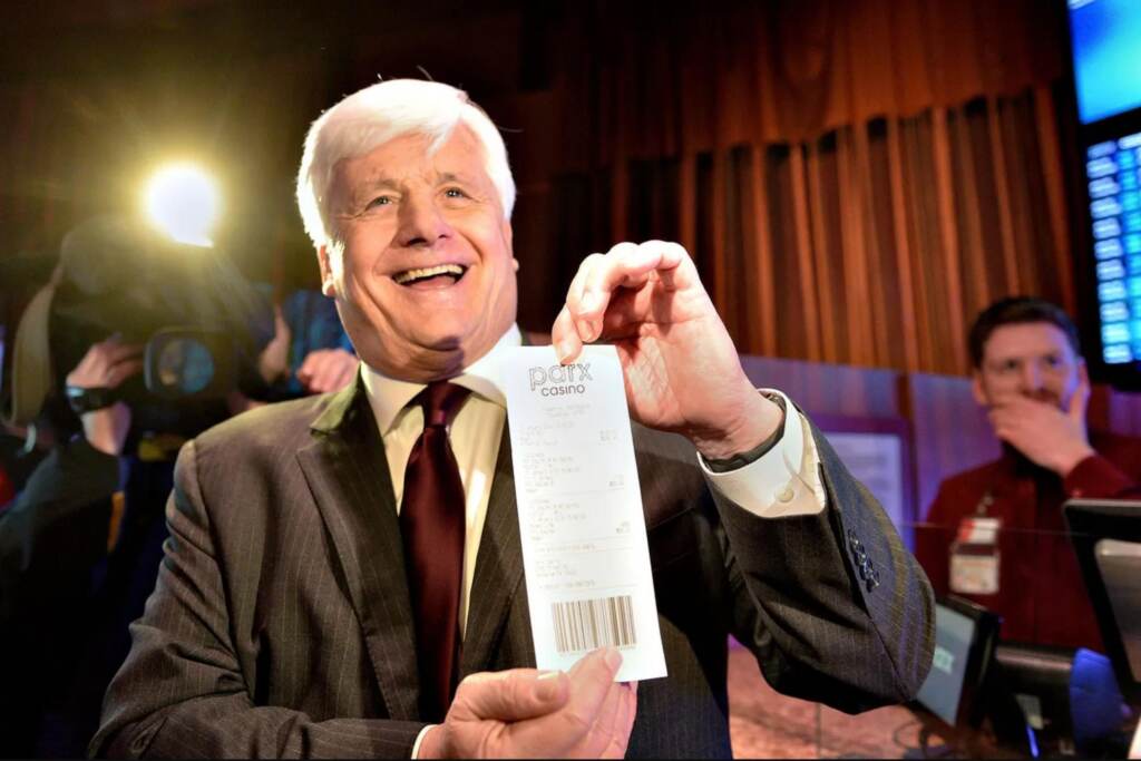 01h4-vhts-11e8-hah9 Sen. Tommy Tomlinson holds a sports betting ticket from Parx Casino.