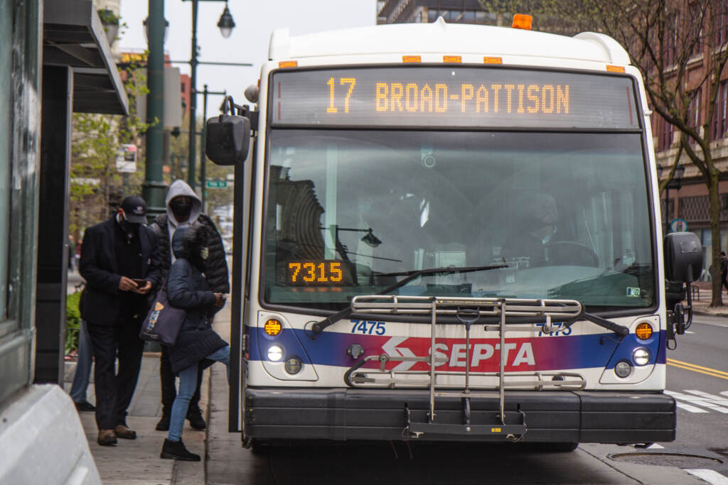 2022 04 19 kpaynter masking on SEPTA-1 SEPTA riders board a bus in Center City, Philadelphia, on April 19, 2022. (Kimberly Paynter/WHYY)