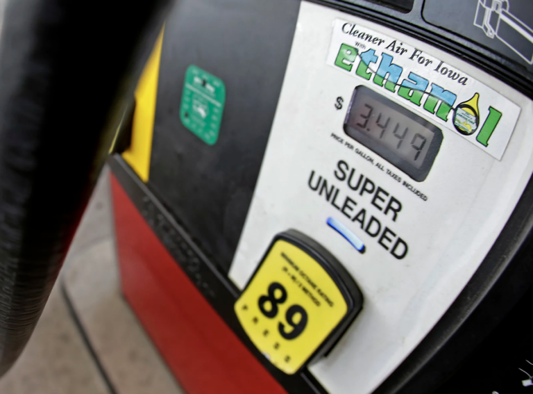 A motorist fills up with gasoline containing ethanol in Des Moines, Iowa. President Biden will announce today that he will lift the summer restriction on gasoline containing the E15 ethanol blend. (Charlie Riedel/AP file photo)