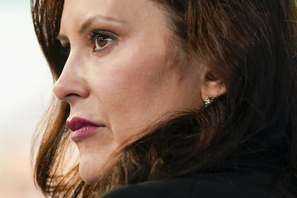 Gretchen Whitmer Michigan Gov. Gretchen Whitmer attends an event with President Joe Biden in the South Court Auditorium on the White House campus, Wednesday, March 9, 2022, in Washington. Prosecutors in the trial of four men charged with planning to kidnap Michigan Gov. Gretchen Whitmer are showing jurors profanity-filled messages and social media posts on Thursday, March 10, by two of the men, some months before the FBI got involved in the case