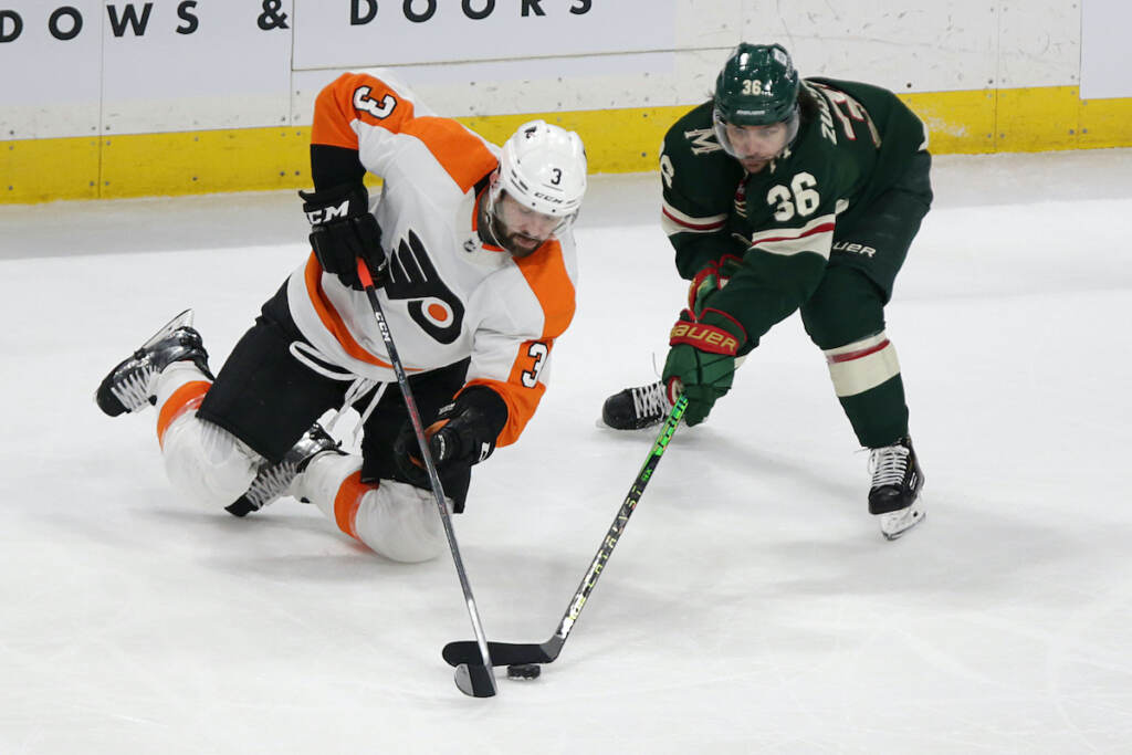 Keith Yandle, Mats Zuccarello Philadelphia Flyers defenseman Keith Yandle (3) and Minnesota Wild right wing Mats Zuccarello (36) battle for the puck in the third period of an NHL hockey game Tuesday, March 29, 2022, in St. Paul, Minn. (AP Photo/Andy Clayton-King)