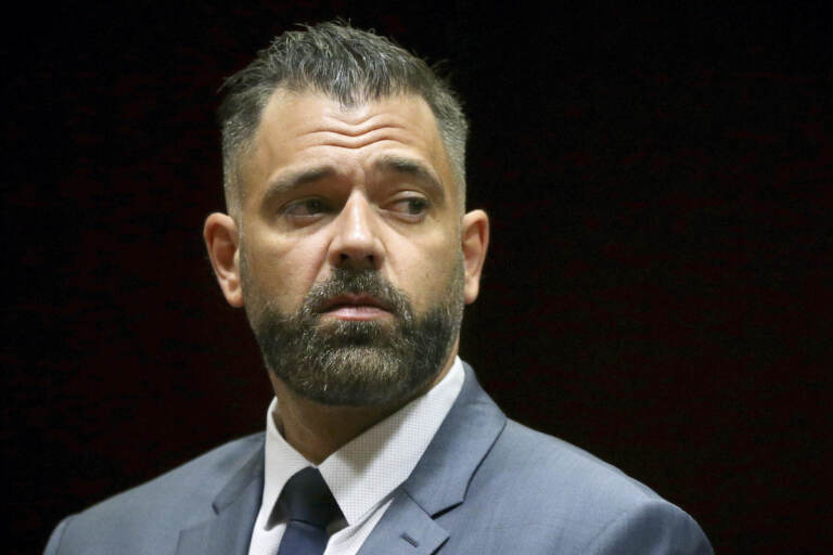 In this May 28, 2019, photo, Mark D'Amico stands during his arraignment to charges including theft by deception at Burlington County Superior Court in Mount Holly, N.J. D'Amico, who conspired with his former girlfriend to cook up a feel-good story about a helpful homeless man and then used the lie to raise hundreds of thousands of dollars in donations online has been sentenced in federal court. D’Amico received a 27-month term on Friday, April 1, 2022