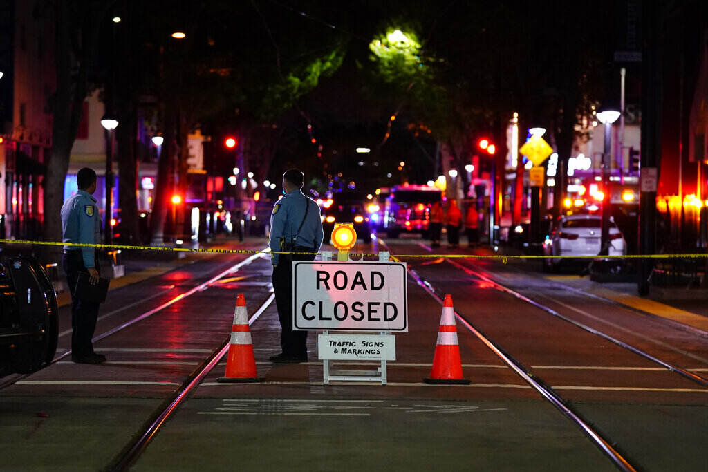 Sacramento Mass Shooting A roadblock is set a block away from the scene of an apparent mass shooting in Sacramento, Calif., Sunday, April 3, 2022.