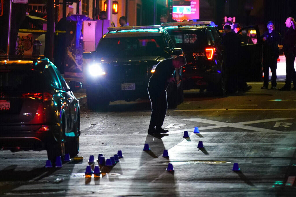 Sacramento Mass Shooting Investigators search for evidence in the area of a mass shooting in Sacramento, Calif. April 3, 2022.