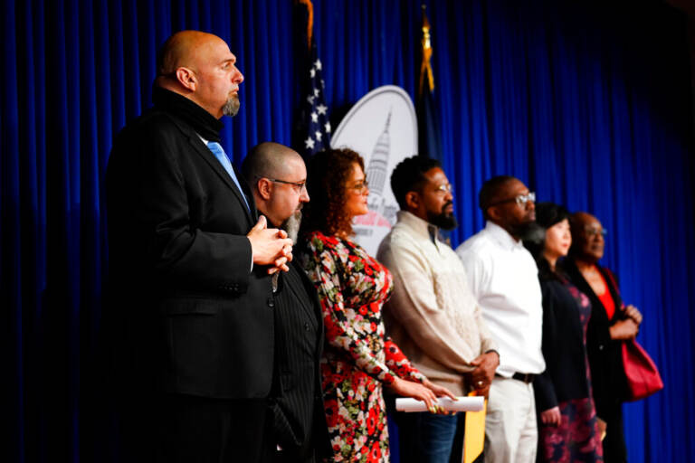 Pennsylvania Lt. Gov. John Fetterman listens at a news conference about moving the process to apply for clemency online to improve access to criminal justice and to reduce the wait by years, at the Pennsylvania Capitol in Harrisburg, Pa., Monday, April 4, 2022.