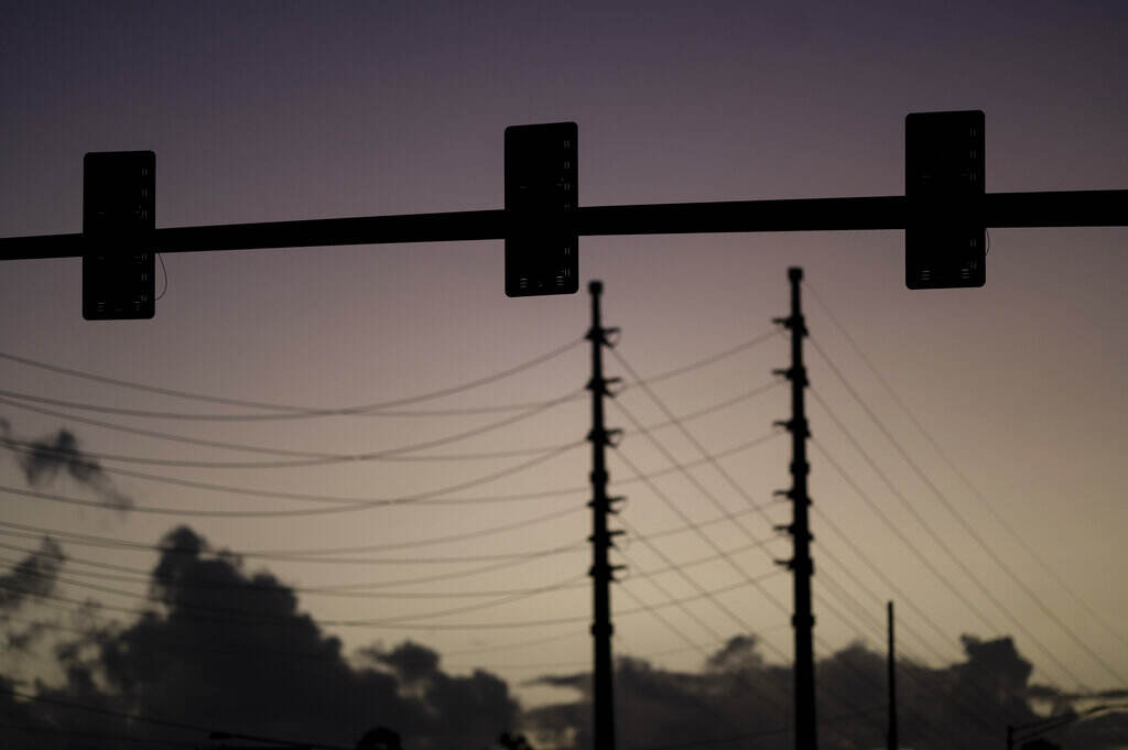 Puerto Rico Black Out Traffic lights are out of service on a street in San Juan, Puerto Rico, early Thursday, April 7, 2022. More than a million customers in Puerto Rico remained without electricity on Thursday after a fire at a main power plant caused the biggest blackout so far this year across the U.S. territory, forcing it to cancel classes and shutter government offices.