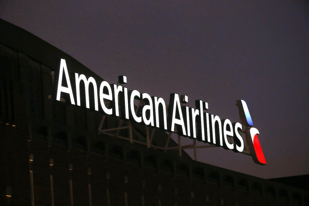 American Airlines-Buses The American Airlines logo on top of the American Airlines Center, prior to an NHL hockey game between the Washington Capital and Dallas Stars, in Dallas, Texas on December 19, 2017. (AP Photo/ Michael Ainsworth)