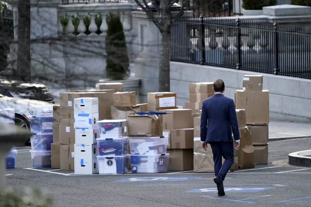 Diplomatic Gifts File photo: A man walks past boxes that were moved out of the Eisenhower Executive Office building, just outside the West Wing, inside the White House complex, Thursday, Jan. 14, 2021, in Washington. The State Department says it's unable to compile a complete accounting of gifts presented to U.S. officials by foreign governments during the final year of the Trump administration due to missing White House data