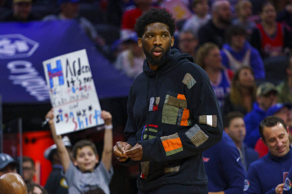 Pistons 76ers Basketball Philadelphia 76ers' Joel Embiid looks on as he has the night off during the first half of an NBA basketball game against the Detroit Pistons, Sunday, April 10, 2022, in Philadelphia.