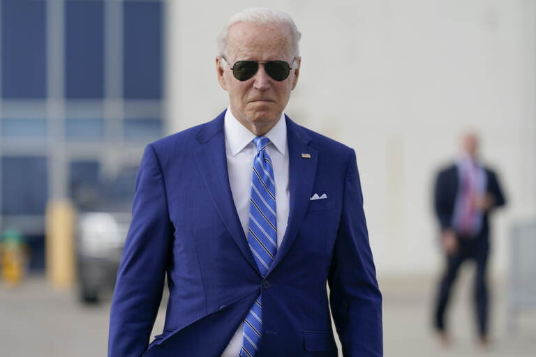 President Joe Biden walks to speak to reporters before boarding Air Force One at Des Moines International Airport, in Des Moines Iowa, Tuesday, April 12, 2022, en route to Washington. (AP Photo/Carolyn Kaster)