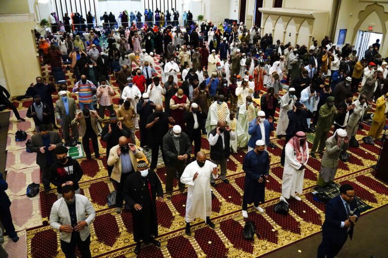 File photo: Worshippers perform an Eid al-Fitr prayer at the Masjidullah Mosque in Philadelphia, Thursday, May 13, 2021. This year, in a rare convergence, Judaism’s Passover, Christianity’s Easter and Islam’s holy month of Ramadan are interlapping in April with holy days for Buddhists, Baha’is, Sikhs, Jains and Hindus, offering different faith groups a chance to share meals and rituals in a range of interfaith events.