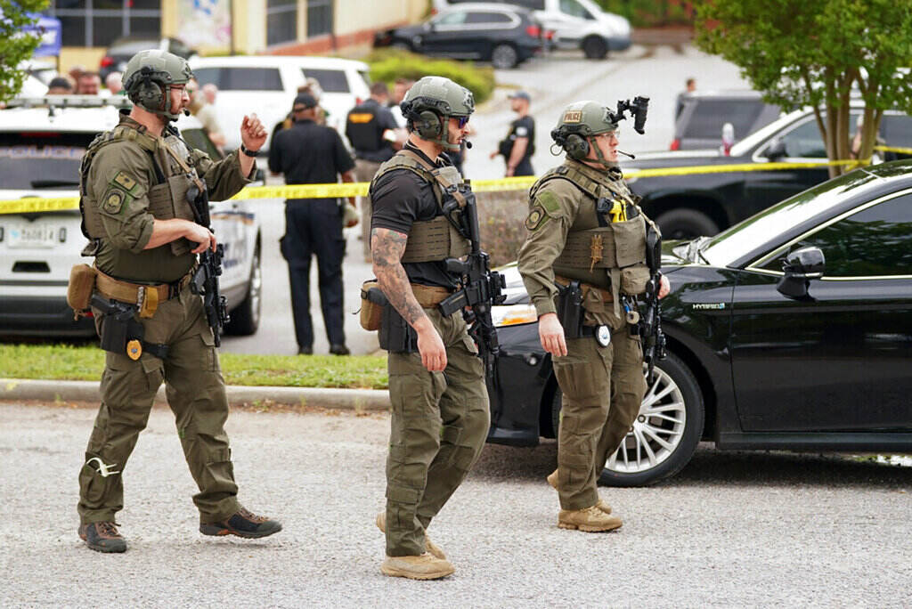 Mall Shooting South Carolina Authorities stage outside Columbiana Centre mall in Columbia, S.C., following a shooting, Saturday, April 16, 2022.