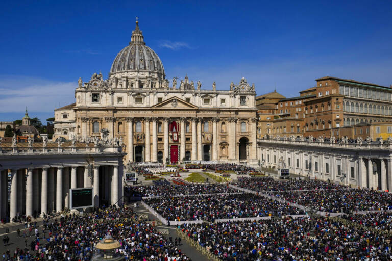 Faithful gather to attend the Catholic Easter Sunday mass led by Pope Francis in St. Peter's Square at the Vatican, Sunday, April 17, 2022. For many Christians, this weekend marks the first time in three years they will gather in person to celebrate Easter Sunday.