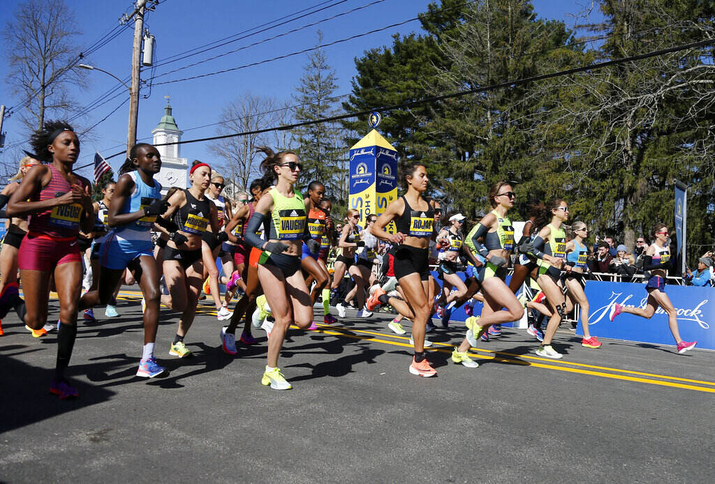 Boston Marathon The elite women break from the starting line of the 126th Boston Marathon, Monday, April 18, 2022, in Hopkinton, Mass.
