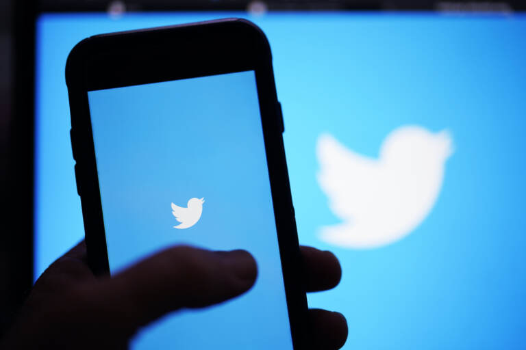 FILE - The Twitter application is seen on a digital device, Monday, April 25, 2022, in San Diego.  The idea that Elon Musk might want to relax Twitter’s content standards after he buys the company is downright alarming for people who have endured waves of harassment and abuse on the platform. The fear is that the hands-off approach Musk has championed will allow Twitter to become more of haven for hate speech, bullying and disinformation.   (AP Photo/Gregory Bull, File)