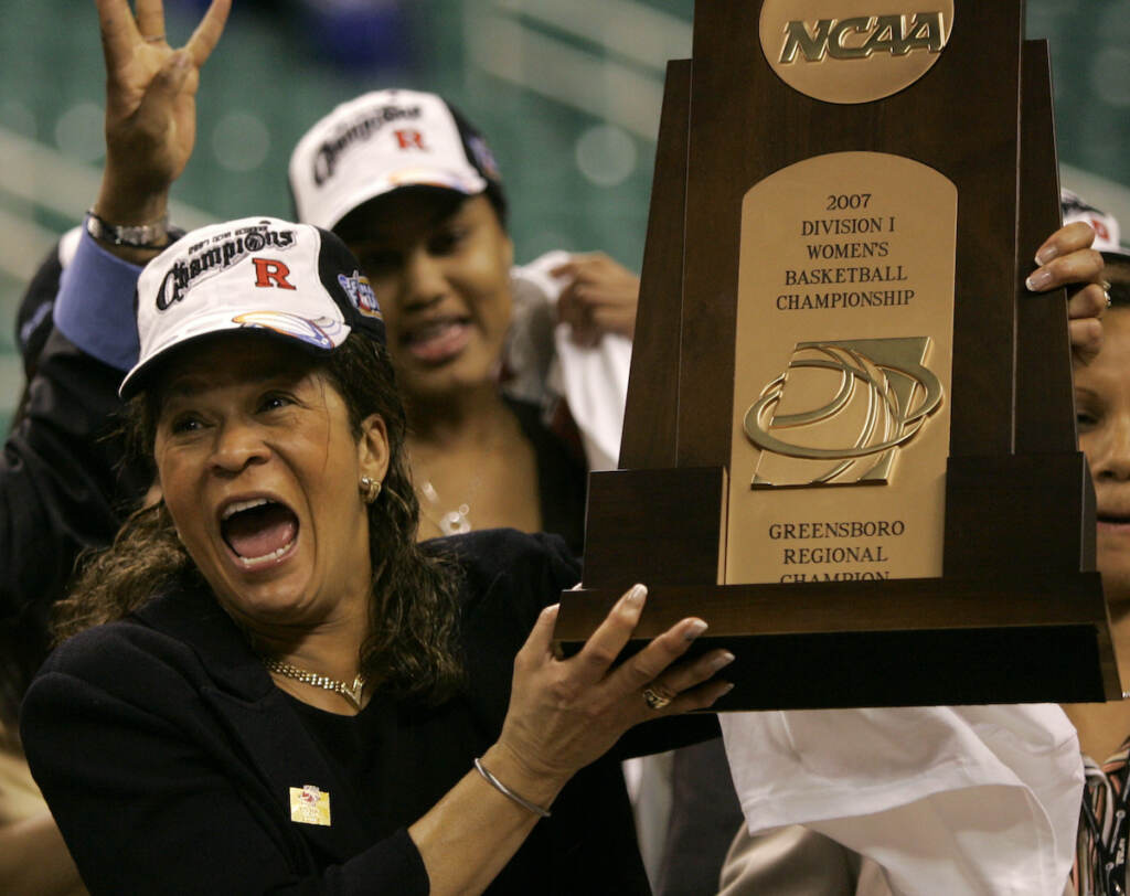 Stringer Retirement Basketball File photo: Rutgers coach C. Vivian Stringer holds the trophy after Rutgers defeated Arizona State 64-45 in the regional final of the NCAA women's basketball tournament in Greensboro, N.C., Monday, March 26, 2007. Stringer has announced her retirement, Saturday, April 30, 2022, after 50 years in college basketball. She finished with 1,055 wins, fourth all-time among Division I women’s basketball coaches.