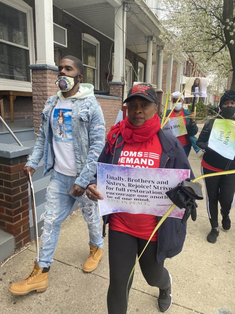 Treska Frisby, an organizer and survivor of gun violence, walks in Trenton's March For Peace on Palm Sunday