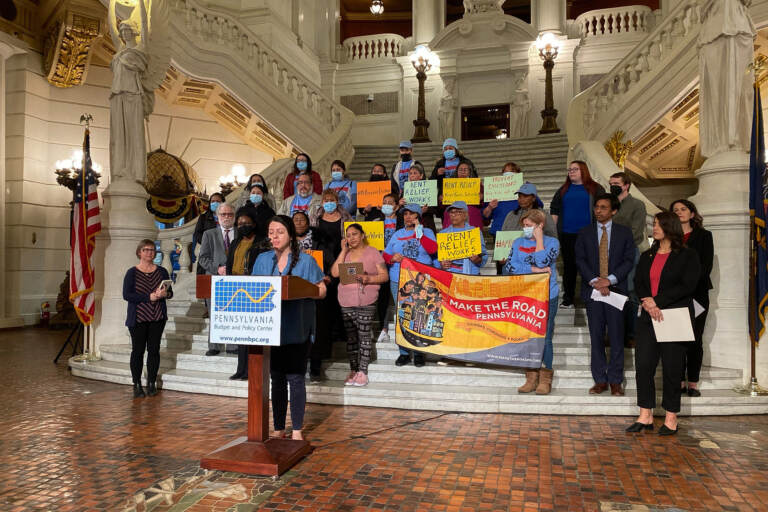 Patty Torres, organizing director for Latino advocacy group Make The Road PA, speaks at the capital. She's accompanied by member leaders of Make The Road, State Sen. Nikil Saval, and State Representatives Sara Innamorato and Elizabeth Fiedler. (Armando Jiminez-Carbarin / Make the Road Pennsylvania)