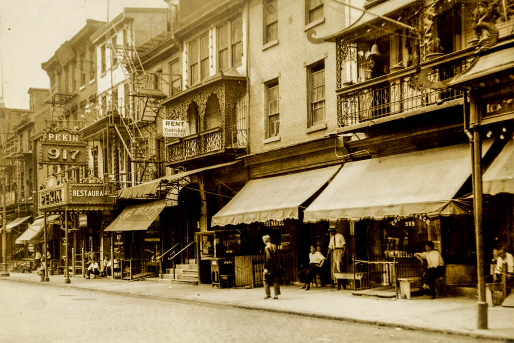 An old photograph of businesses on Race Street in Chinatown