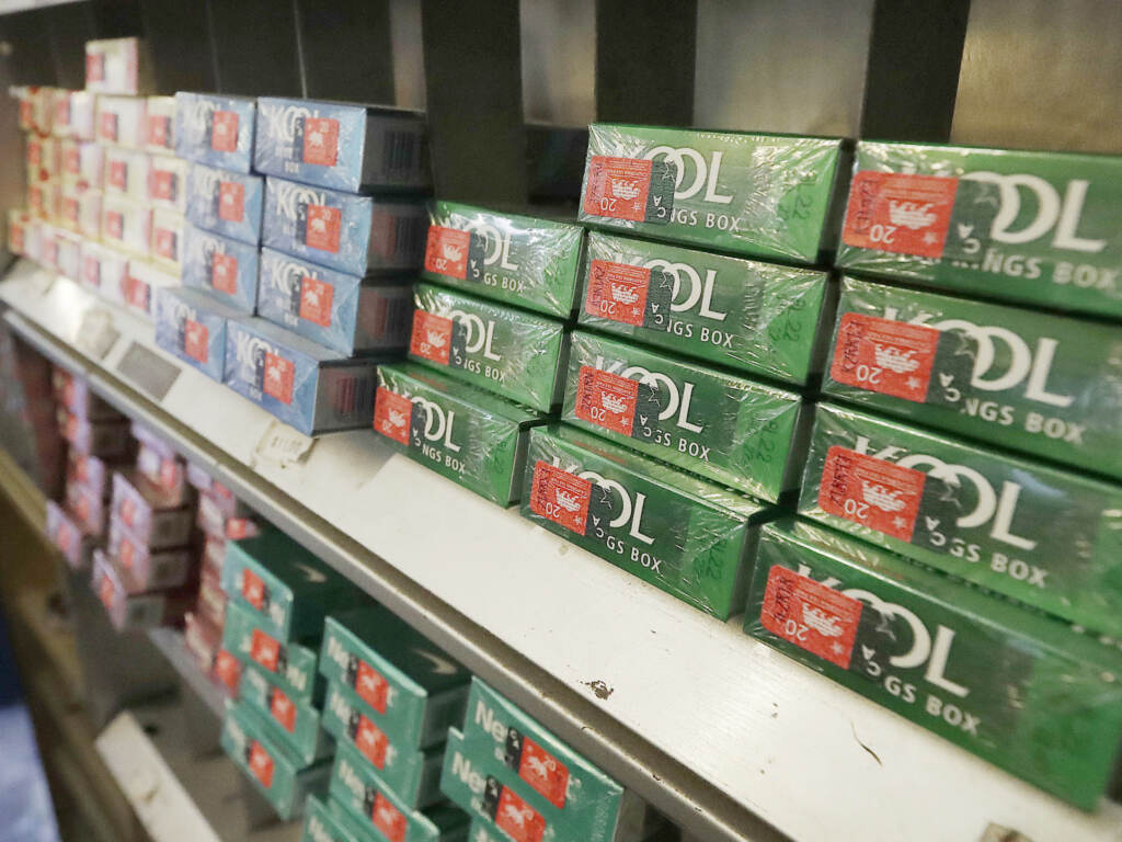 Menthol cigarettes and other tobacco products are displayed at a store in San Francisco in 2018. FILE - This May 17, 2018 file photo shows packs of menthol cigarettes and other tobacco products at a store in San Francisco. As federal officials finalize a long-awaited plan to ban menthol cigarettes, dozens of interest groups have met with White House staffers to try and influence the process, which has the potential to save thousands of lives while wiping out billions in tobacco sales. (AP Photo/Jeff Chiu, File)