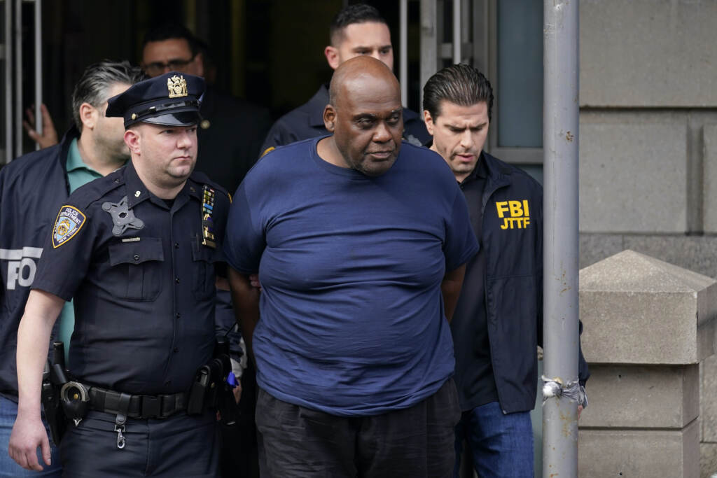 Frank R. James New York City Police and law enforcement officials lead subway shooting suspect Frank R. James, 62, center, away from a police station