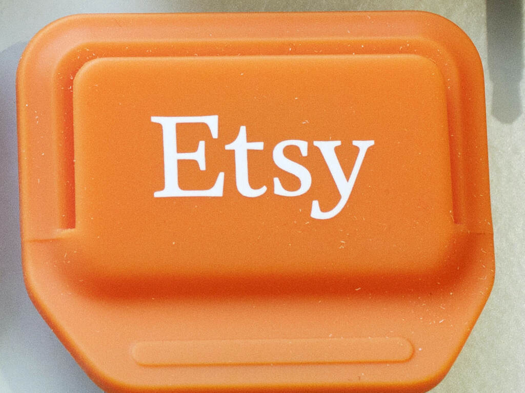 FILE - This Tuesday, Jan. 6, 2015 file photo shows an Etsy mobile credit card reader, in New York. The online crafts retailer on Tuesday, March 31, 2015 said it expects to raise as much as $267 million from an initial public offering values the company at up to $1.78 billion. (AP Photo/Mark Lennihan, File)