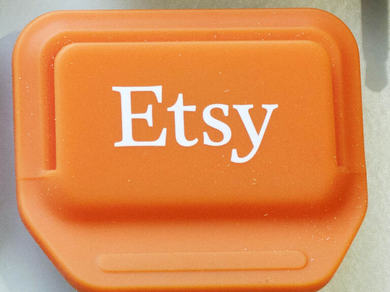 FILE - This Tuesday, Jan. 6, 2015 file photo shows an Etsy mobile credit card reader, in New York. The online crafts retailer on Tuesday, March 31, 2015 said it expects to raise as much as $267 million from an initial public offering values the company at up to $1.78 billion. (AP Photo/Mark Lennihan, File)