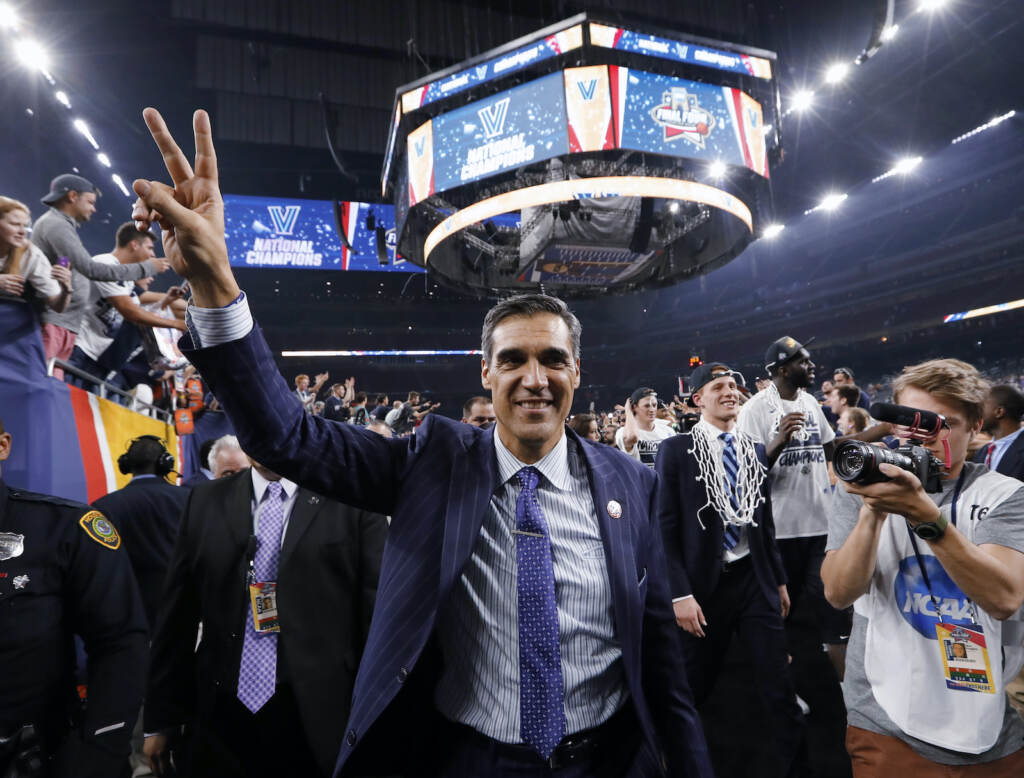 Villanova Wright Basketball Villanova head coach Jay Wright throws up a peace sign