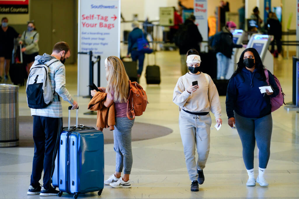 Airlines-Masks-Banned Passengers Travelers wearing face masks at PHL Airport