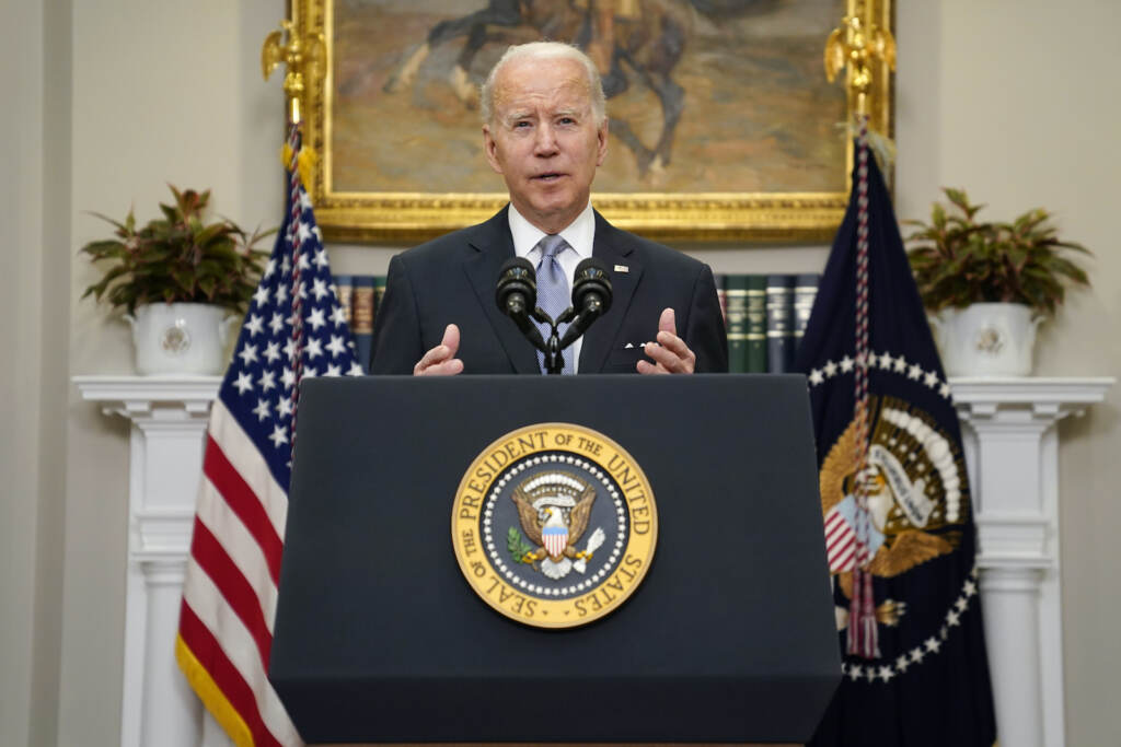Joe Biden President Joe Biden delivers remarks from a podium at the White House