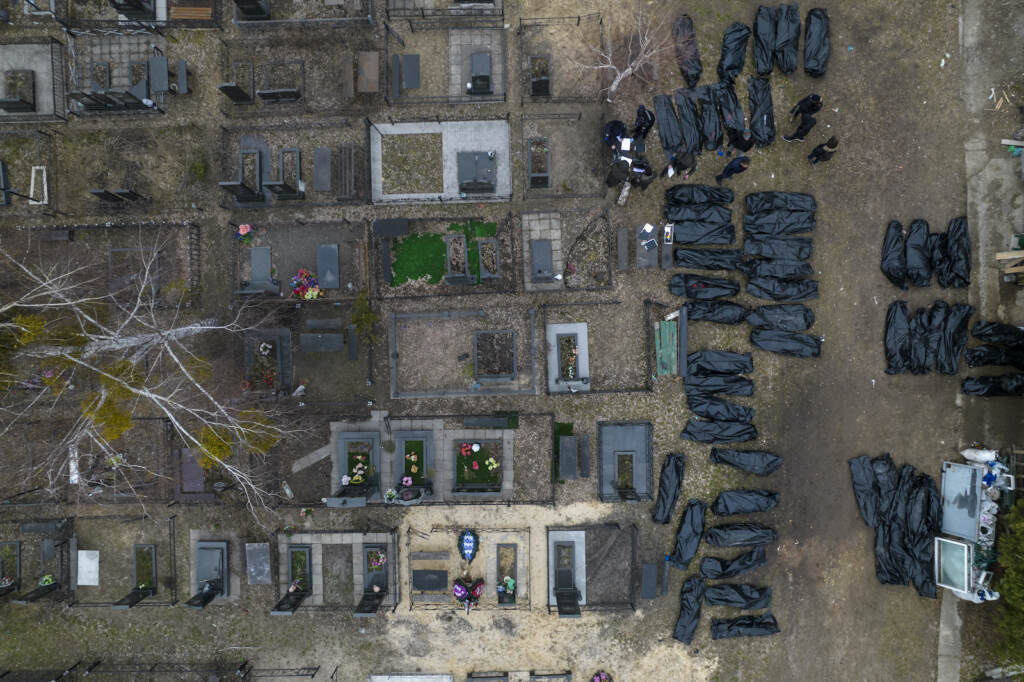APTOPIX Russia Ukraine War Bucha is seen from above, with extensive damage and bodies of civilians killed wrapped in plastic bags
