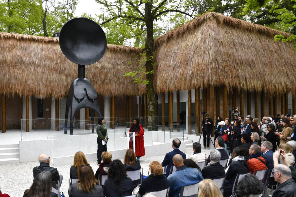 Italy Venice Biennale Leigh Simone Leigh, in red, stands in front of her